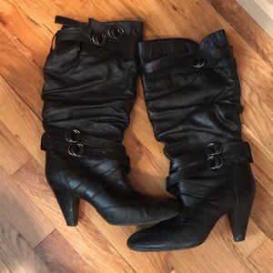 Black leather boot with heal